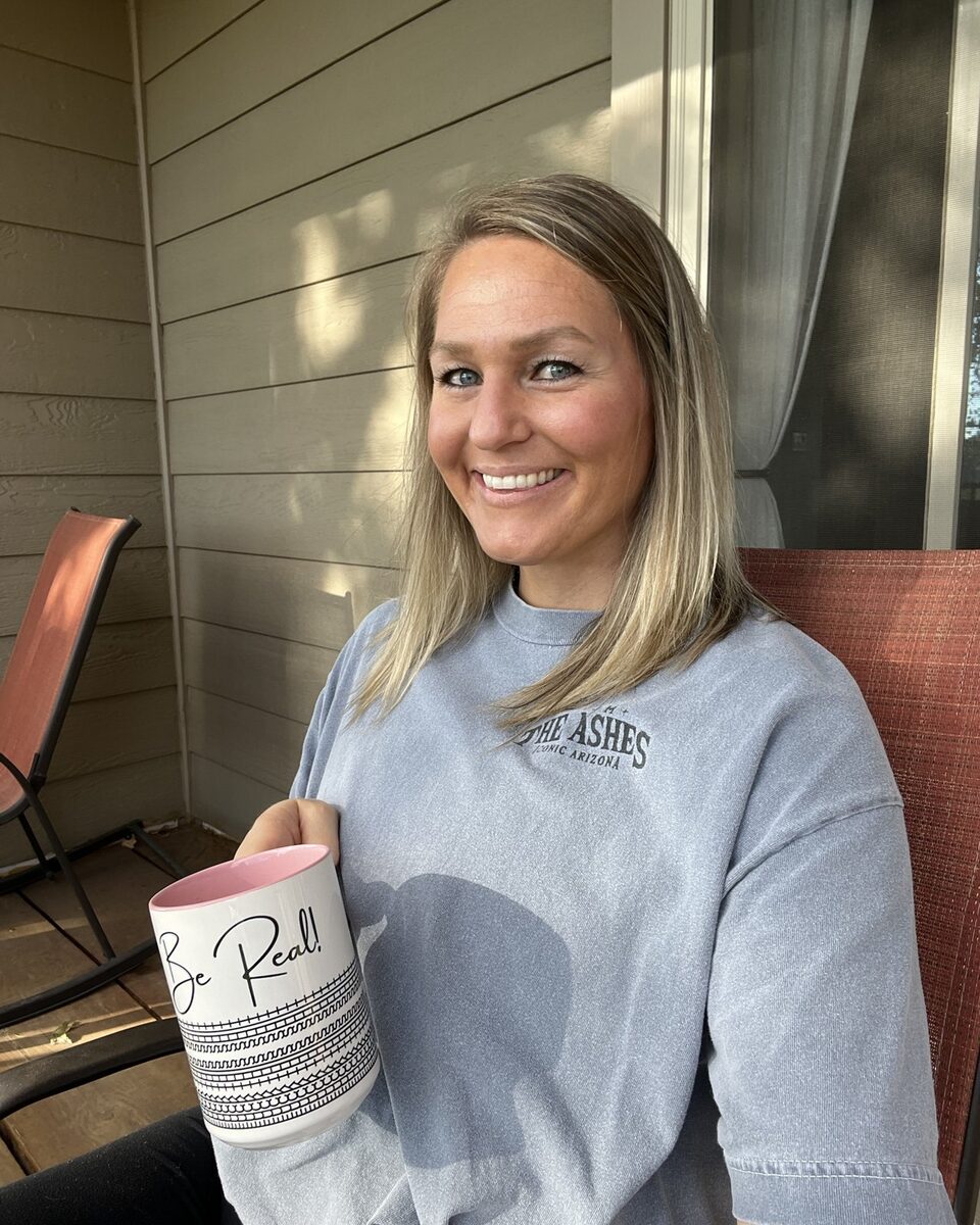 Stacia smiling outdoors